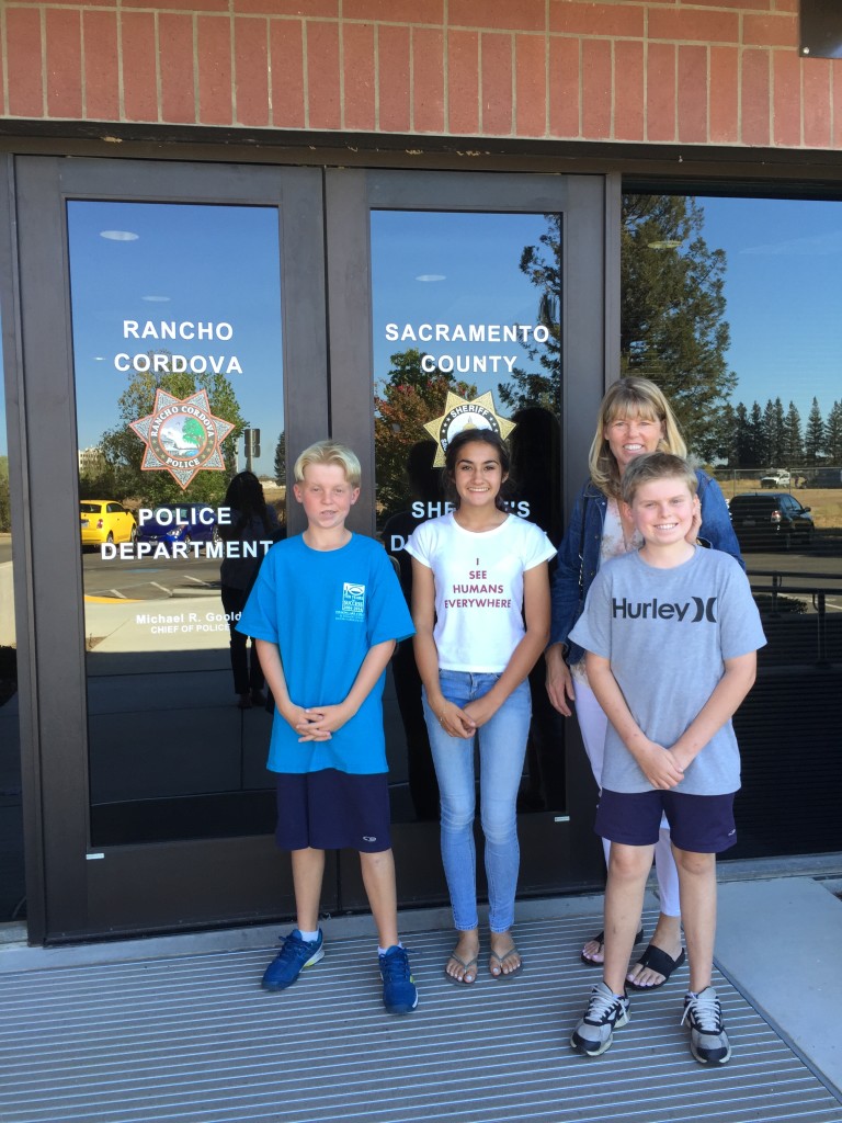 Kyle Rutz, Maya Snow, Susan Rutz, and Lleyton Rutz outside Rancho Cordova PD. September 22, 2015.