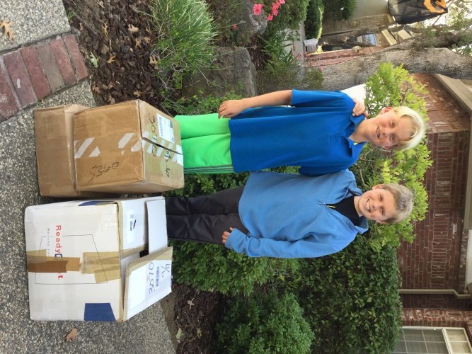Kyle Rutz and Lleyton Rutz with LEGO donation from Ali Bleecker and family of Wilmette, IL